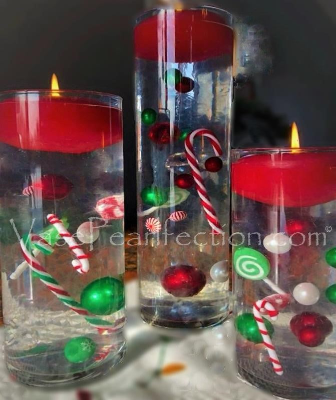 Candyland navideño "flotante": bastones de caramelo, piruletas, gemas festivas rojas y verdes - Decoración de jarrones